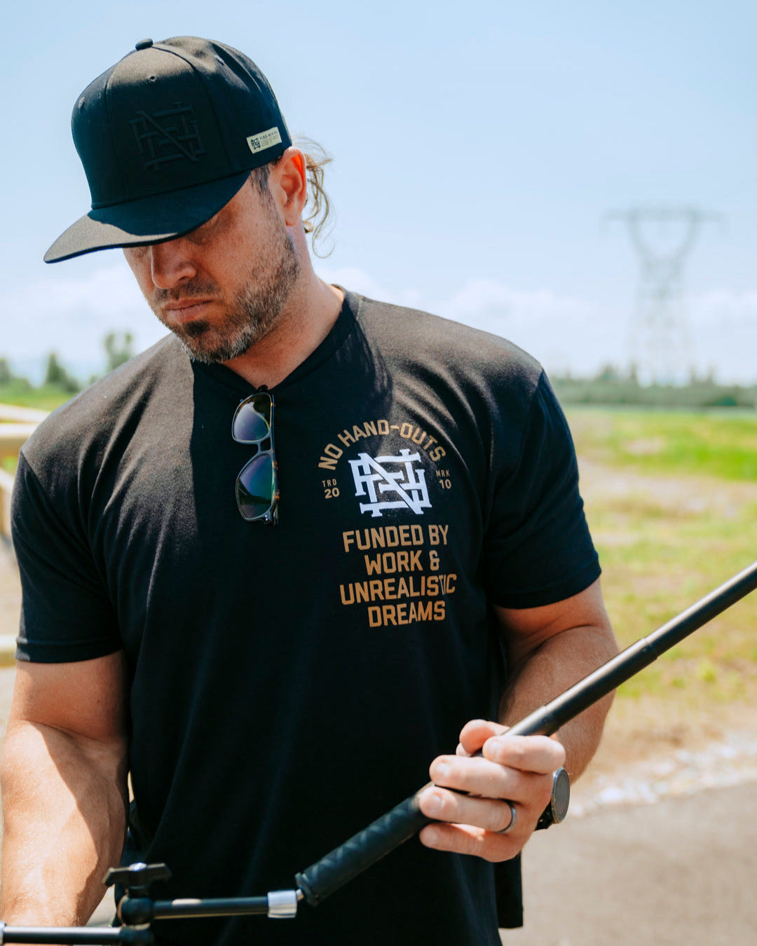 NO HAND OUTS TEE - BLACK – FLAG NOR FAIL