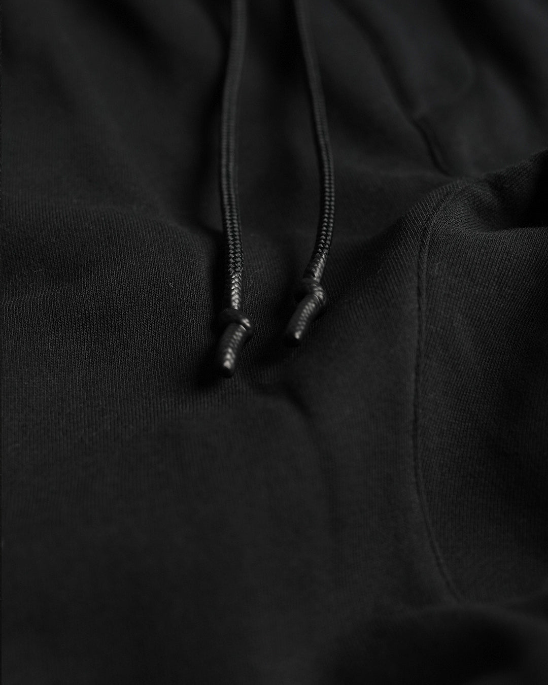 EMBOSSED FITTED JOGGERS-BLACK